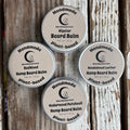 Tin of beard balm on a wooden background