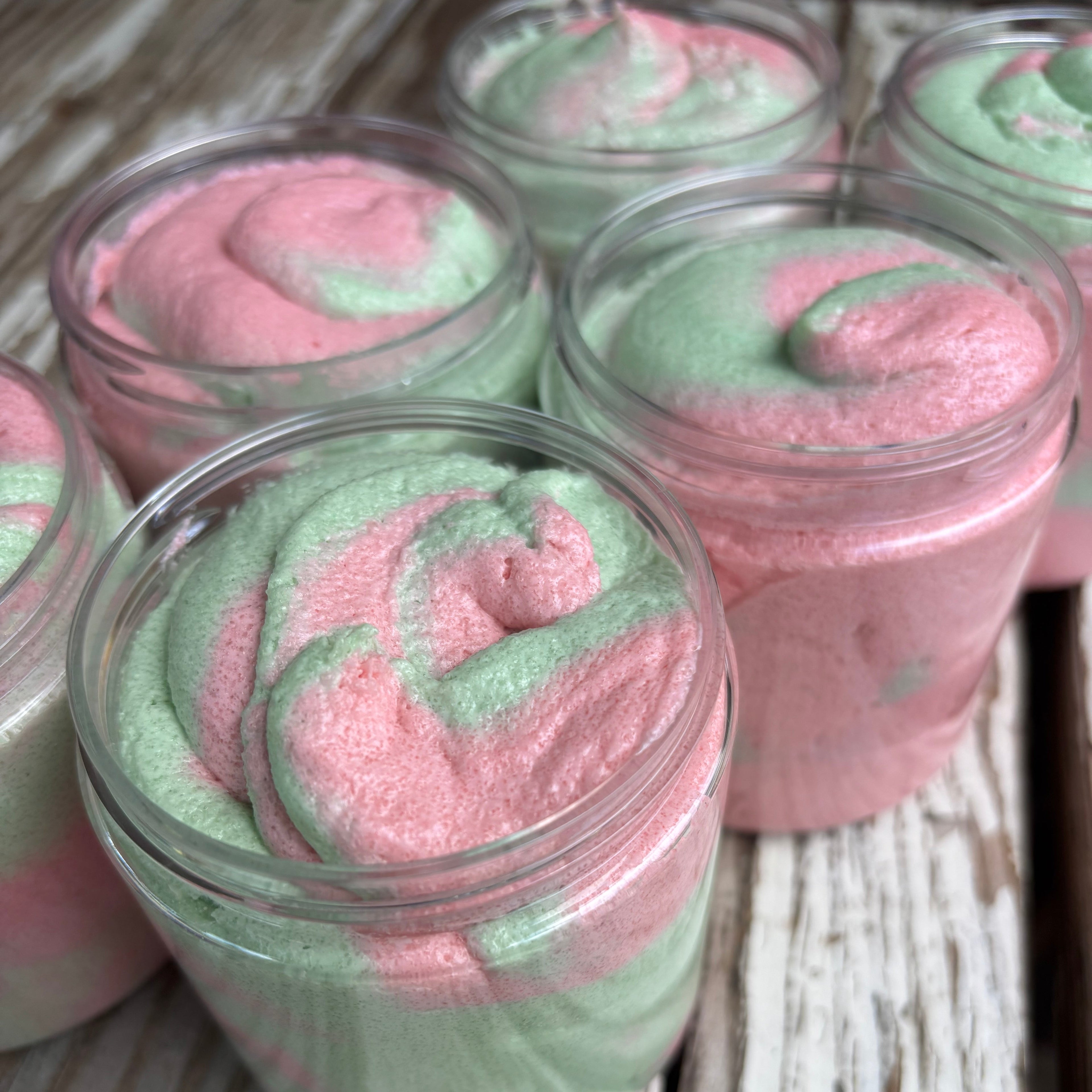 Pink and green swirled sugar scrubs